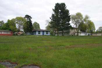 Back of orderly room (532) and chow hall (blue, 534). Barracks right of chow hall were BOQ (630).